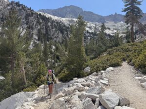 A hiker trains for a Yosemite backpacking trip by walking uphill.
