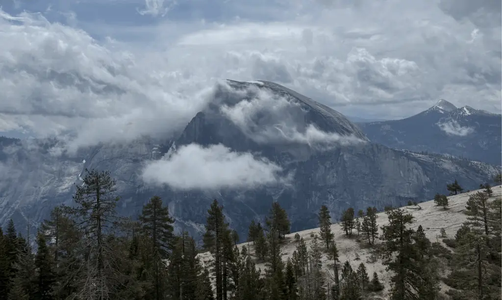 Half Dome in Yosemite, with clouds crossing the face